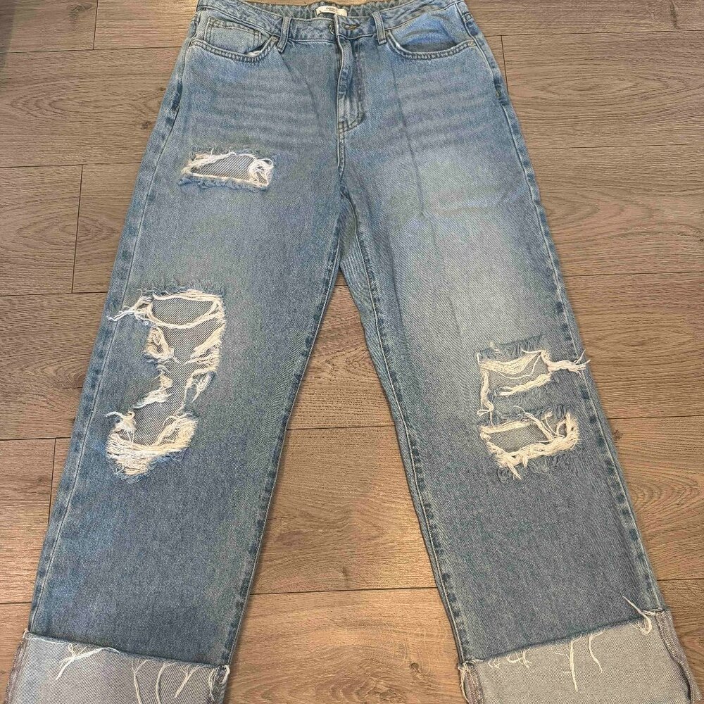Distressed cuffed jeans